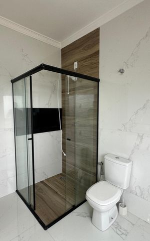 Casa de condomínio à venda com 250m², 3 quartos e 4 vagasBanheiro da Suíte 1