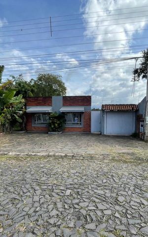 Casa à venda com 149m², 2 quartos e 4 vagas Casa à venda com 149m², 2 quartos e 4 vagasFachada