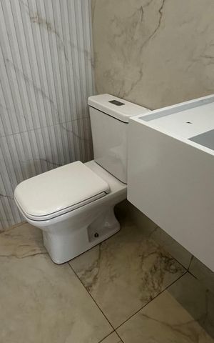 Casa de condomínio à venda com 273m², 4 quartos e 3 vagas Casa de condomínio à venda com 273m², 4 quartos e 3 vagasLavabo
