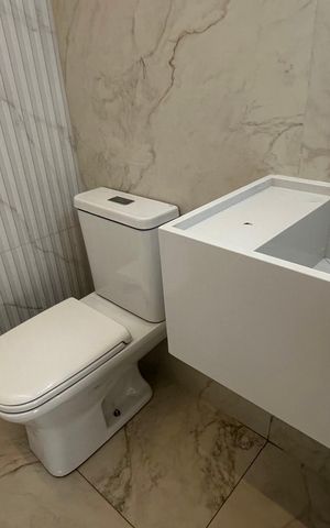Casa de condomínio à venda com 273m², 4 quartos e 3 vagas Casa de condomínio à venda com 273m², 4 quartos e 3 vagasLavabo