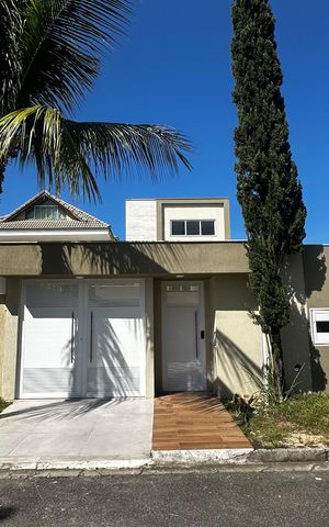 Casa de condomínio à venda com 273m², 4 quartos e 3 vagas Casa de condomínio à venda com 273m², 4 quartos e 3 vagasFachada