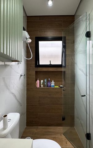 Casa à venda com 140m², 3 quartos e 4 vagas Casa à venda com 140m², 3 quartos e 4 vagasBanheiro da Suíte 1