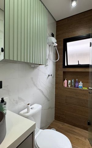 Casa à venda com 140m², 3 quartos e 4 vagas Casa à venda com 140m², 3 quartos e 4 vagasBanheiro da Suíte 1