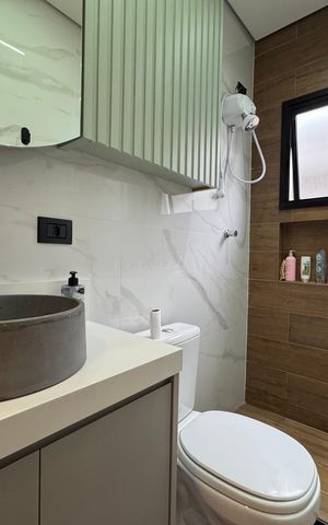 Casa à venda com 140m², 3 quartos e 4 vagas Casa à venda com 140m², 3 quartos e 4 vagasBanheiro da Suíte 1