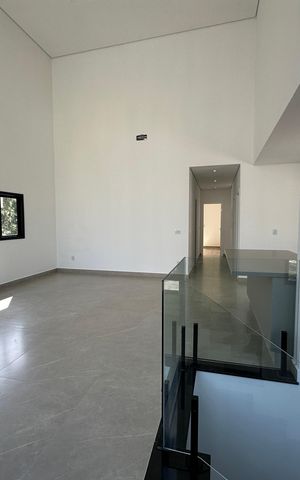Casa de condomínio à venda com 304m², 4 quartos e 4 vagasSala