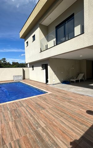 Casa de condomínio à venda com 304m², 4 quartos e 4 vagasPiscina