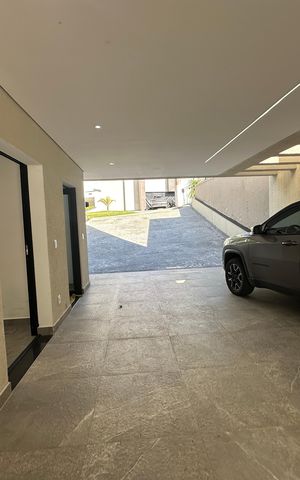Casa de condomínio à venda com 304m², 4 quartos e 4 vagasGaragem