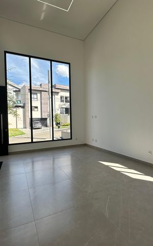 Casa de condomínio à venda com 304m², 4 quartos e 4 vagasSala