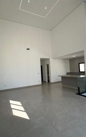Casa de condomínio à venda com 304m², 4 quartos e 4 vagasSala