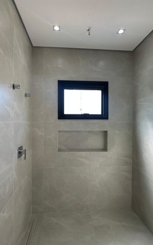 Casa de condomínio à venda com 304m², 4 quartos e 4 vagasBanheiro da Suíte 2
