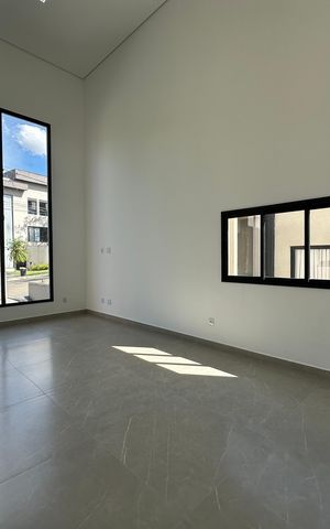 Casa de condomínio à venda com 304m², 4 quartos e 4 vagasSala