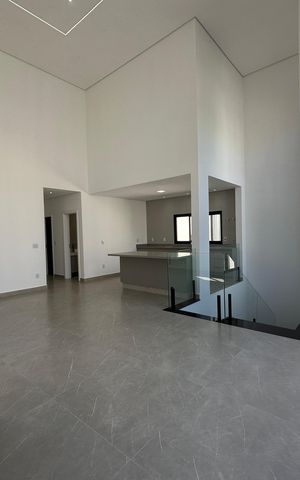 Casa de condomínio à venda com 304m², 4 quartos e 4 vagasSala