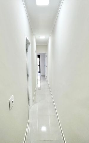 Casa à venda com 123m², 3 quartos e 2 vagas Casa à venda com 123m², 3 quartos e 2 vagasCorredor