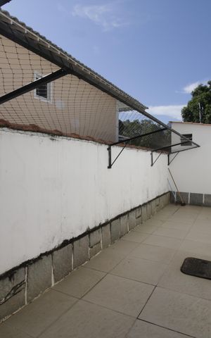Casa de condomínio para alugar com 375m², 4 quartos e 2 vagasQuintal