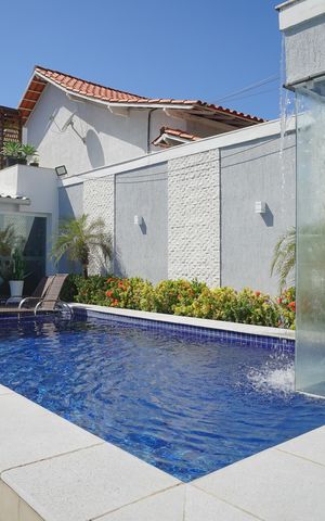 Casa à venda com 249m², 4 quartos e 2 vagas Casa à venda com 249m², 4 quartos e 2 vagasPiscina