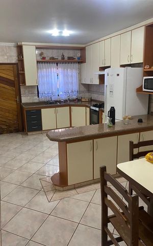 Casa à venda com 164m², 3 quartos e 2 vagas Casa à venda com 164m², 3 quartos e 2 vagasCozinha
