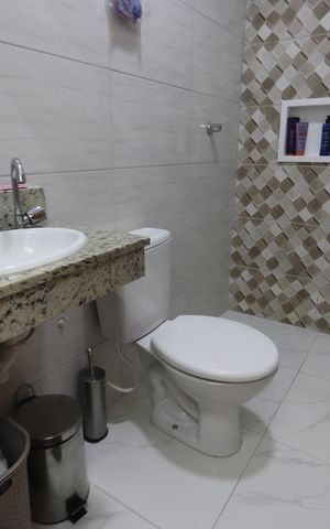 Casa à venda com 99m², 3 quartos e 2 vagasBanheiro da Suíte