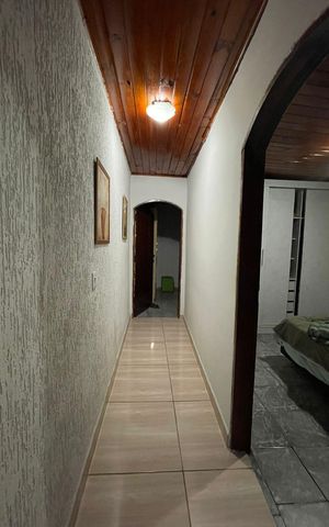 Casa à venda com 48m², 3 quartos e sem vaga Casa à venda com 48m², 3 quartos e sem vagaCorredor