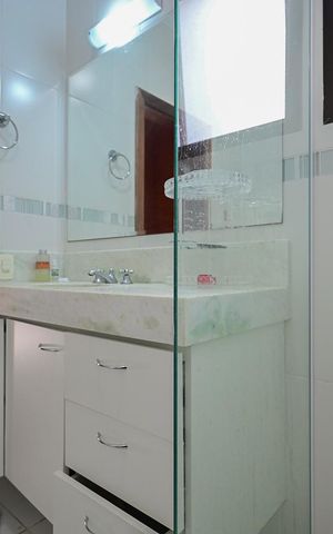 Casa de condomínio à venda com 394m², 4 quartos e 4 vagasBanheiro Suíte 2