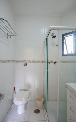 Casa de condomínio à venda com 394m², 4 quartos e 4 vagasBanheiro Suíte 1