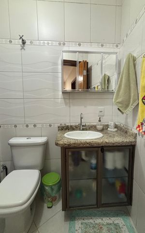 Casa à venda com 128m², 3 quartos e 2 vagasBanheiro