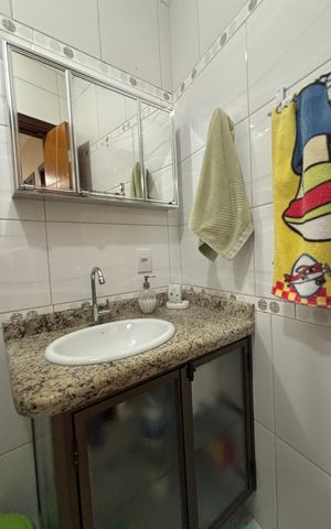 Casa à venda com 128m², 3 quartos e 2 vagasBanheiro