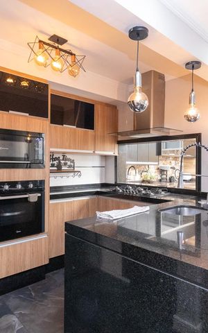 Casa de condomínio à venda com 100m², 3 quartos e 2 vagas Casa de condomínio à venda com 100m², 3 quartos e 2 vagasCozinha