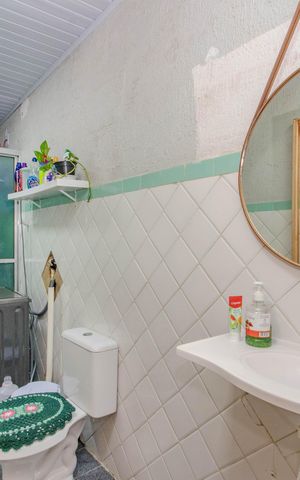 Casa à venda com 60m², 1 quarto e 2 vagas Casa à venda com 60m², 1 quarto e 2 vagasBanheiro