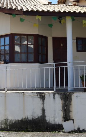 Casa de condomínio à venda com 71m², 2 quartos e 1 vaga Casa de condomínio à venda com 71m², 2 quartos e 1 vagaFachada