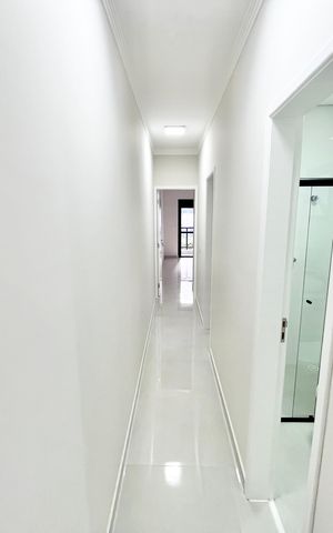 Casa à venda com 123m², 3 quartos e 2 vagas Casa à venda com 123m², 3 quartos e 2 vagasCorredor