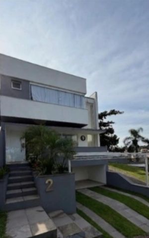 Casa de condomínio à venda com 50m², 3 quartos e 2 vagas Casa de condomínio à venda com 50m², 3 quartos e 2 vagasFachada