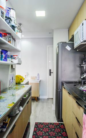 Apartamento à venda com 64m², 2 quartos e 1 vaga Apartamento à venda com 64m², 2 quartos e 1 vagaCozinha e Área de Serviço