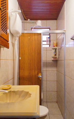 Casa à venda com 77m², 2 quartos e 1 vagaBanheiro
