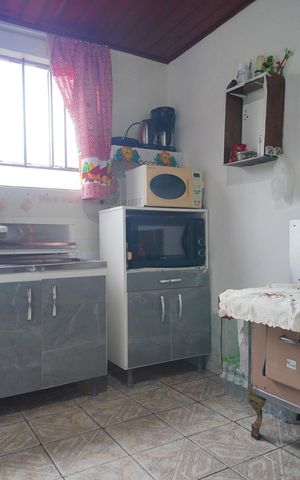 Casa à venda com 77m², 2 quartos e 1 vagaCozinha