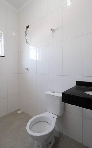 Casa à venda com 99m², 2 quartos e 2 vagasSuíte 2