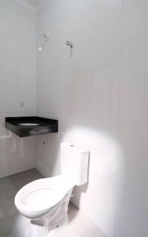 Casa à venda com 99m², 2 quartos e 2 vagasSuíte 1