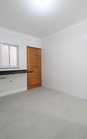 Casa à venda com 99m², 2 quartos e 2 vagasCozinha e Área de Serviço
