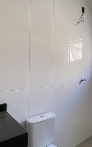 Casa à venda com 126m², 2 quartos e 2 vagas Casa à venda com 126m², 2 quartos e 2 vagasBanheiro da Suíte 2
