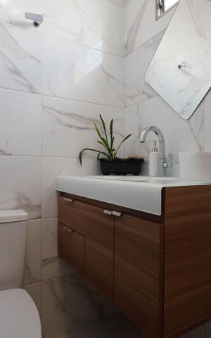 Casa à venda com 72m², 2 quartos e 1 vaga Casa à venda com 72m², 2 quartos e 1 vagaBanheiro da Suíte 1