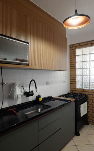 Casa à venda com 72m², 2 quartos e 1 vaga Casa à venda com 72m², 2 quartos e 1 vagaCozinha - Armários