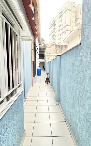 Casa à venda com 250m², 3 quartos e 2 vagas Casa à venda com 250m², 3 quartos e 2 vagasCorredor