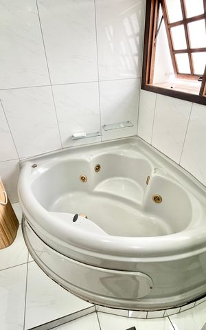 Casa à venda com 250m², 3 quartos e 2 vagas Casa à venda com 250m², 3 quartos e 2 vagasBanheiro da Suíte