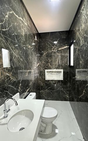Casa de condomínio à venda com 178m², 3 quartos e 2 vagasBanheiro da Suíte 1