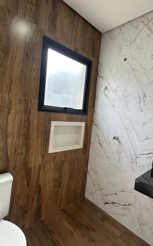Casa de condomínio à venda com 178m², 3 quartos e 2 vagasBanheiro da Suíte 2