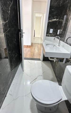 Casa de condomínio à venda com 178m², 3 quartos e 2 vagasBanheiro da Suíte 1