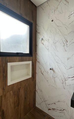 Casa de condomínio à venda com 178m², 3 quartos e 2 vagasBanheiro da Suíte 2