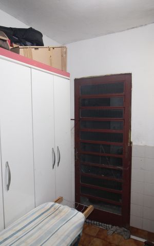 Casa à venda com 120m², 5 quartos e 2 vagasCasa 3 - Área de Serviço