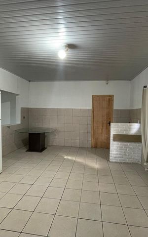 Casa à venda com 80m², 4 quartos e 2 vagas Casa à venda com 80m², 4 quartos e 2 vagasCozinha