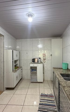 Casa à venda com 121m², 2 quartos e 2 vagas Casa à venda com 121m², 2 quartos e 2 vagasCozinha