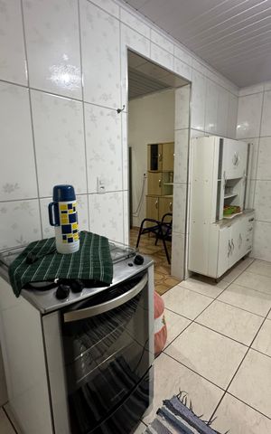 Casa à venda com 121m², 2 quartos e 2 vagas Casa à venda com 121m², 2 quartos e 2 vagasCozinha